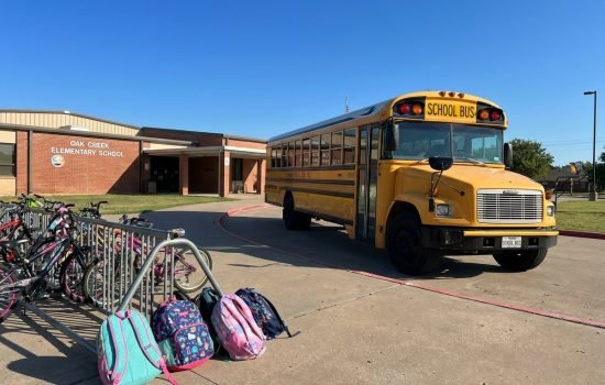 Yellow_school_bus_parked_outside_20260911152118